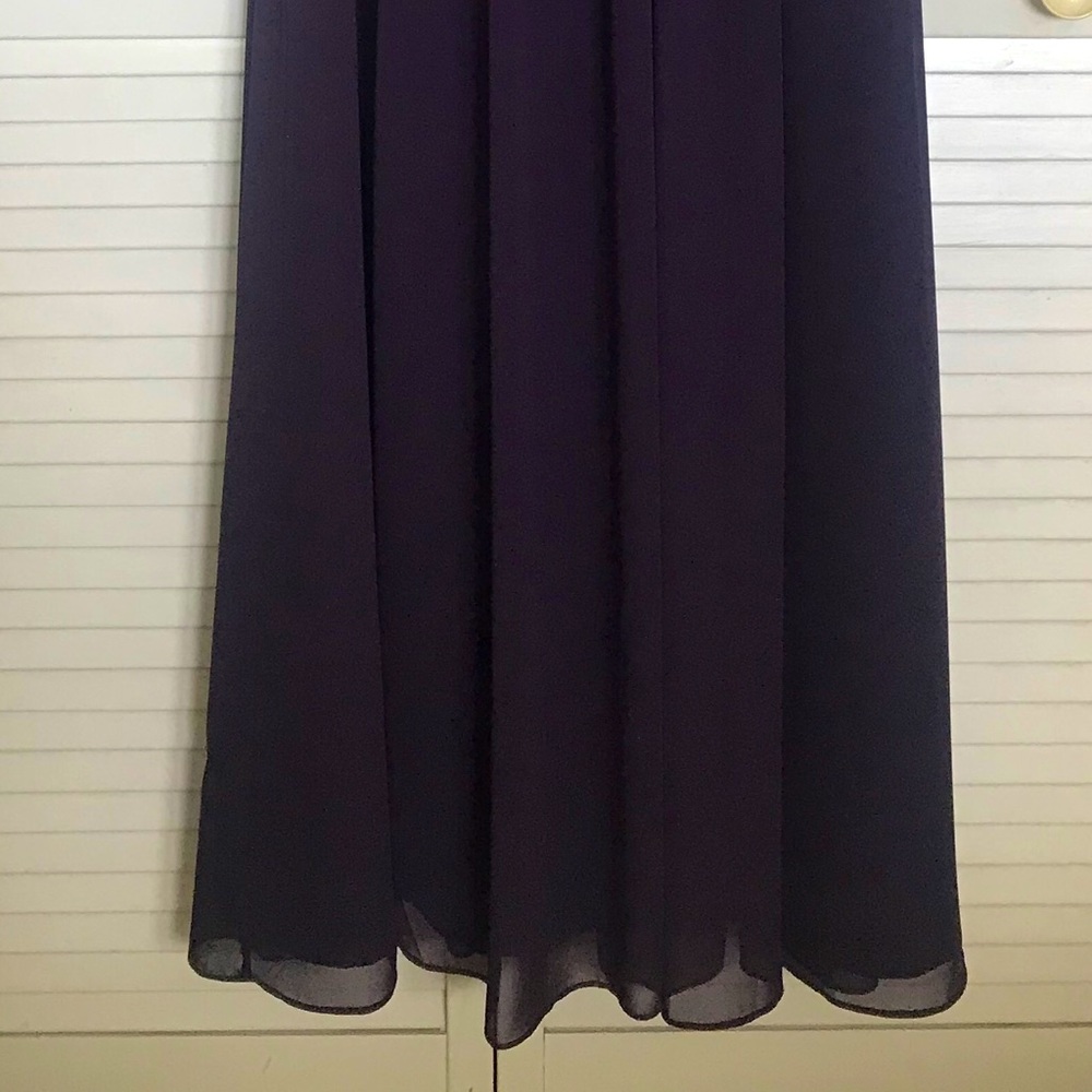 Beautiful purple evening gown .